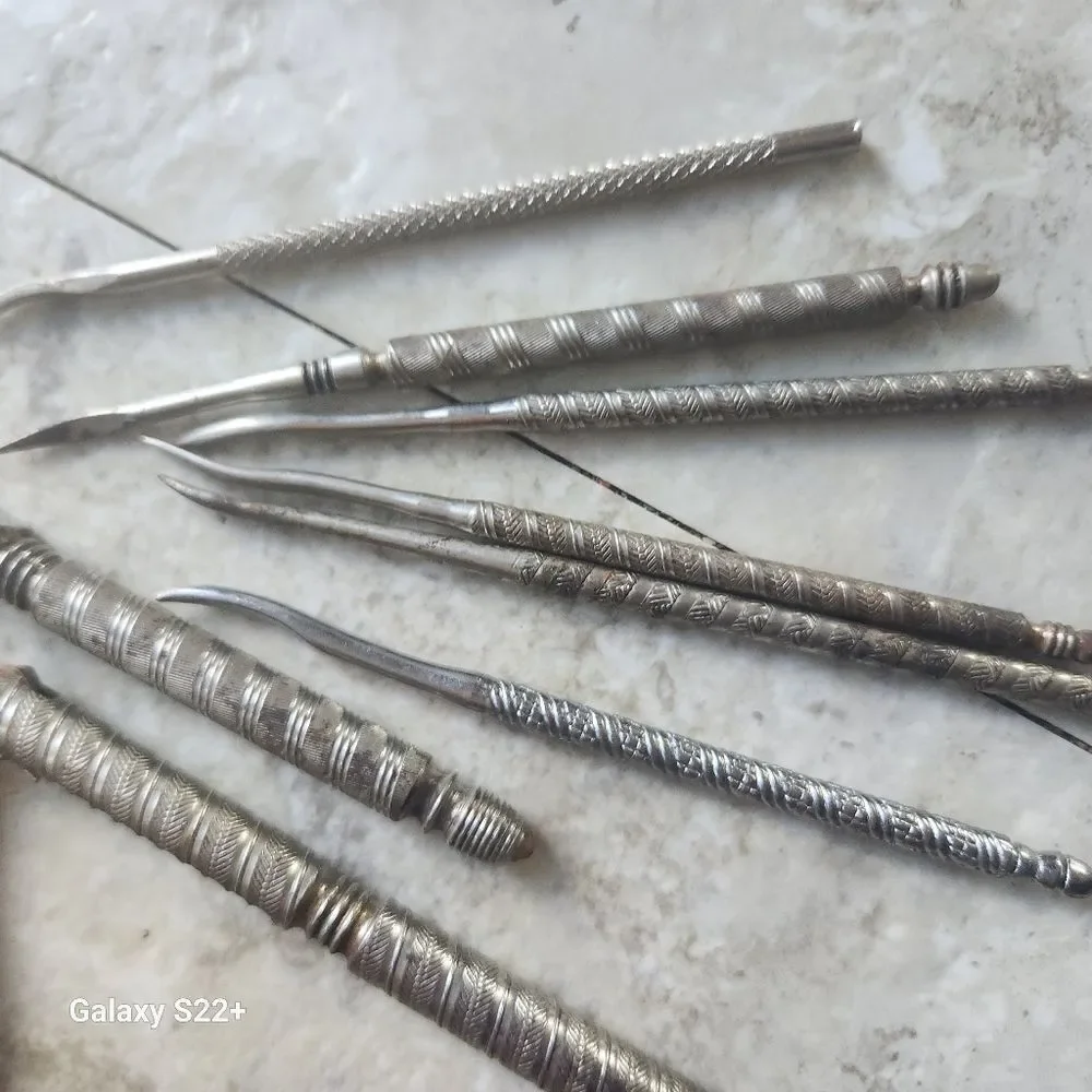 Silver metal Vintage Embossed Nutcracker & Six Picks set